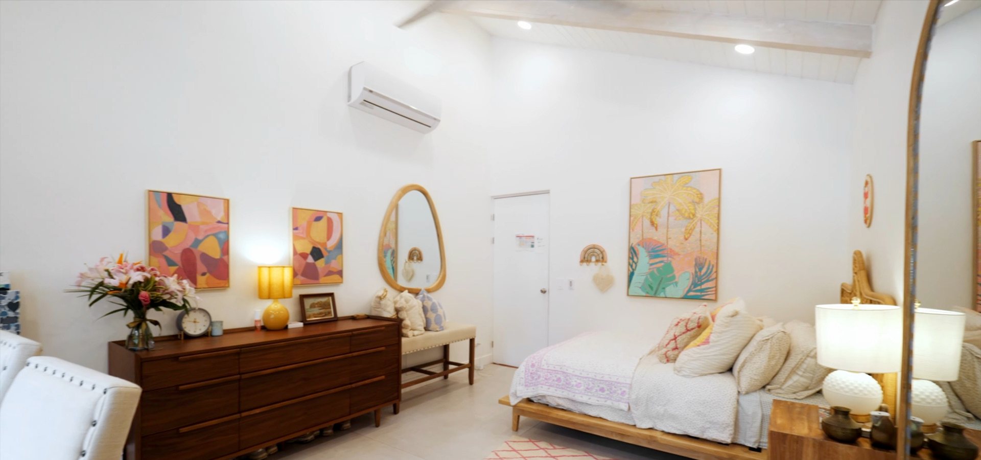 Third bedroom with a sideboard and lounge chair