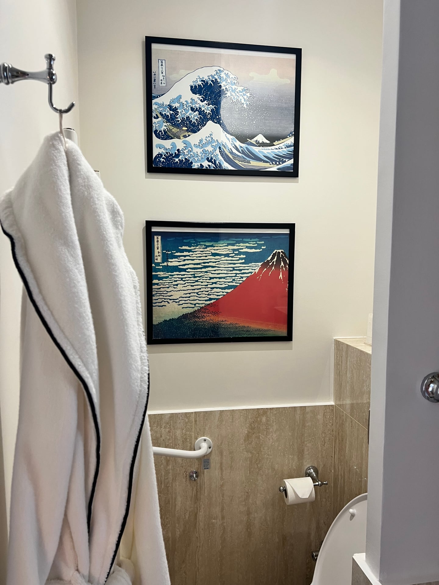 Bathroom with Japanese prints and a robe